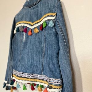 Upcycled denim jacket with trim and fringe! Size large. $50.